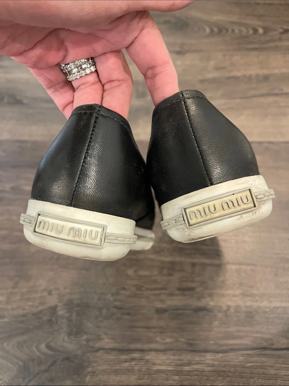 Miu Miu Black Leather Slip-Ons with Silver Cap Toe - Picture 9 of 9